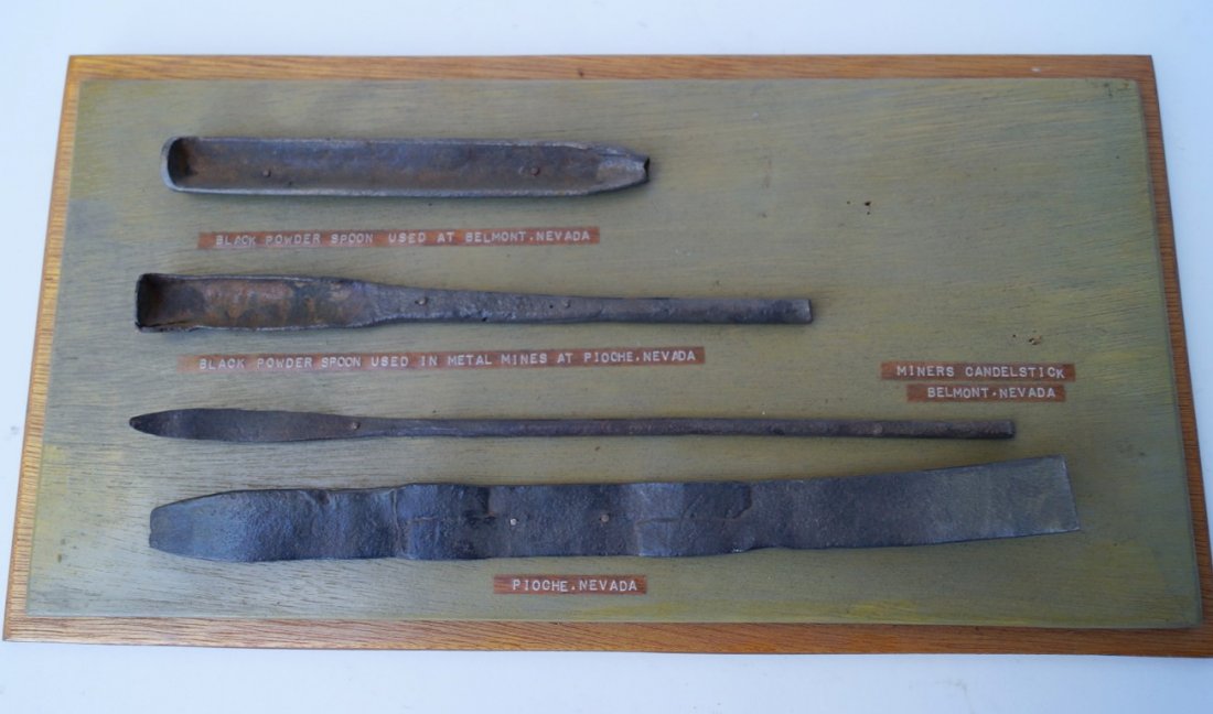An Assemblage of Miners Tools: Mounted on a board. 9" x 17".
