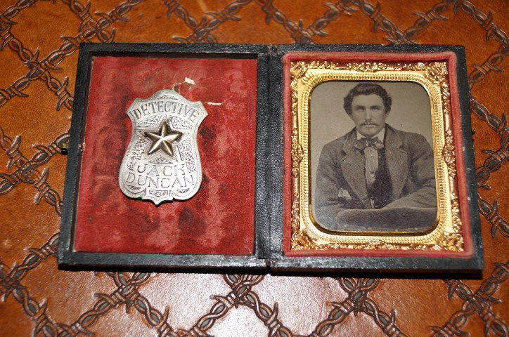 Detective Badge of Jack Duncan & Daguerreotype: Badge belonging to Texas Bounty Hunter Jack Duncan. Most famous manhunt was for John Wesley Hardin but never received the bounty money or credit. It is unsure whether the daguerretype in this lot is o