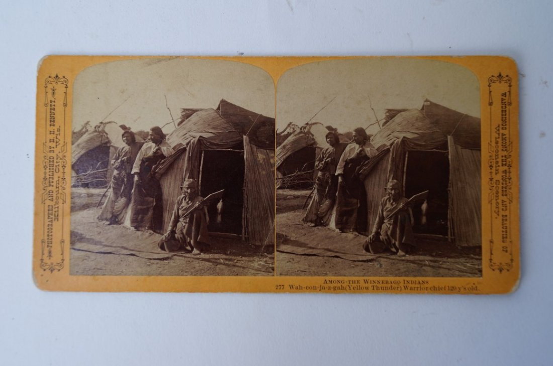 Yellow Thunder-Stereoview Card: By Bennett, Kilbourn City,Wis. Yellow Thunder-Winnebago Warrior Chief reported to be 120 years old in front of hut holding war club. &": x 4"H.