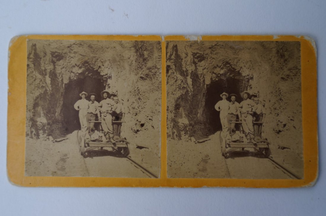 Union Pacific Railroad W. H. Jackson: Stereo view card. Yellow mount. No. 87 Tunnel 4 (pen id) on imprinted green pasteon label on verso for "Scenery of the Union Pacific Railraod. W.H. Jackson, photographer, Omaha, Nebraska. Image of sev