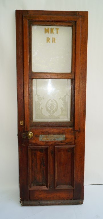 Oak Train Station Door: Turn of the Century oak and etched glass door marked at the top panel MKT RR. (Missouri-Kansas-Texas Railroad) Plaque on the door " Passengers Are Not Allowed to Stand on the Platform" 78"H. x 28"W