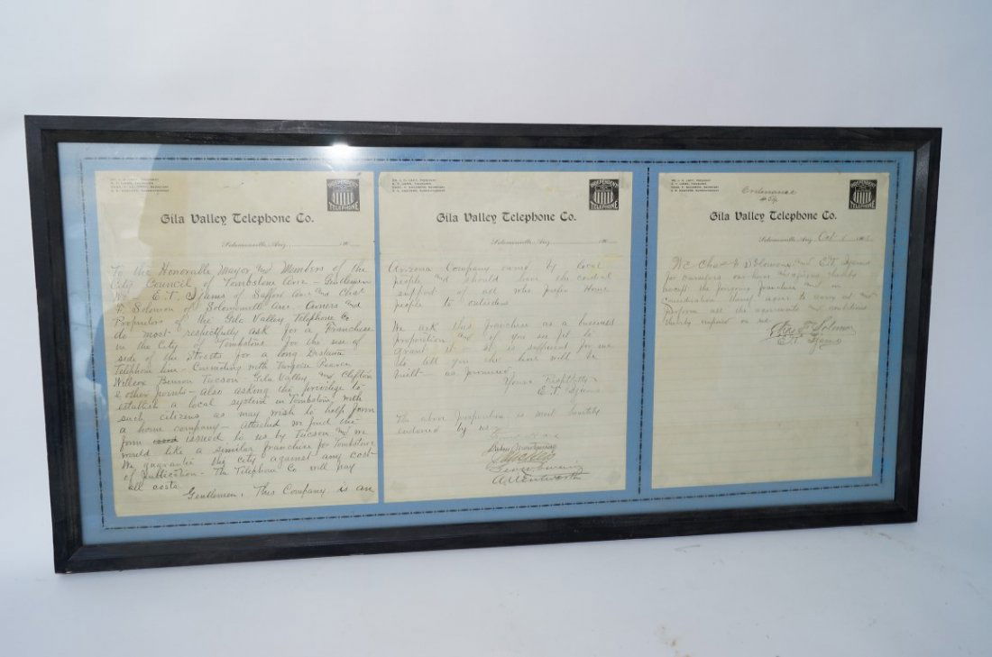 Gila Valley Telephone Company Documents: Three framed documents regarding phone service in Tombstone. Signed by E.T. Ijams, Treasurer and Chas. F. Solomon, Secretary of the Gila Valley Telephone Company. October 1, 1901. 29-3/4" x 13-1/4" h