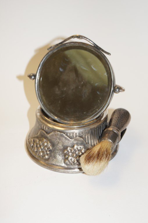 Traveling Shaving Kit Buffalo Bill Cody: Presented to Buffalo Bill by G. W. Lillie aka Pawnee Bill. Plated silver traveling shaving kit with mirror & shaving brush by Biggins Rogers Co. Wallingford, CT. Inscription on front of piece reads Gr