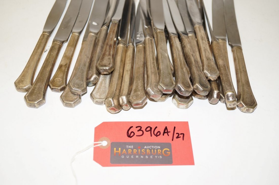 Lot of Hotel Utah Silver Plated Knives: 18 Small knives & 9 large knives for a total of 27. All are Reed & Barton Mirror Steel blades with silver plated handles. The handles are marked Hotel Utah, some are marked with an eagle and a shield.