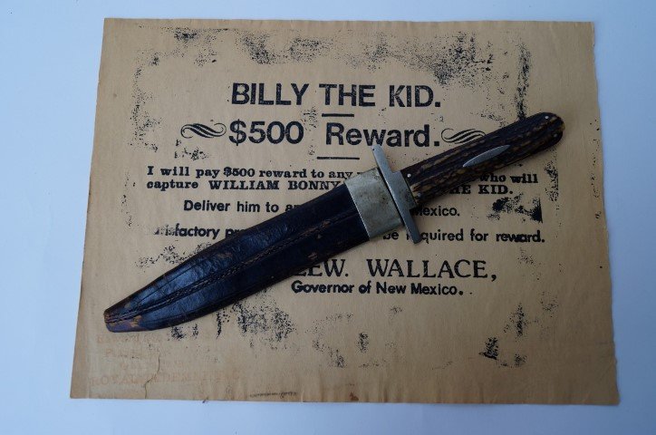 Billy the Kid Knife and Reward Poster: With a copy of a letter regarding the purchase of the stag handled Bowie knife with the initials W.H.B. on the handle on a silver plaque. (William H. Bonney). Included in the lot is a reward poster an