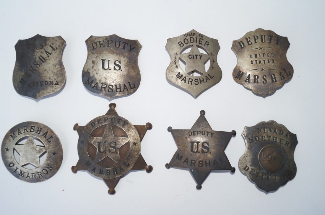Eight Marshal Badges: Eight Marshall Badges to include City; Deputy U.S.; Nevada Northern Detective; Benson, Arizona; Cimarron Marshall etc. Varying sizes
