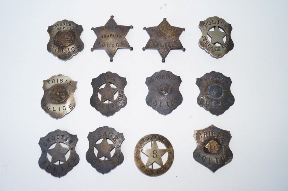 Twelve Police Badges: Twelve Police Badges to include Tiwa Tribal Officer; Seminole Tribe; Osage; Choctaw; Cheyenne; Arapaho; Navajo; Shawnee ; Blackfoot and others. Varying sizes