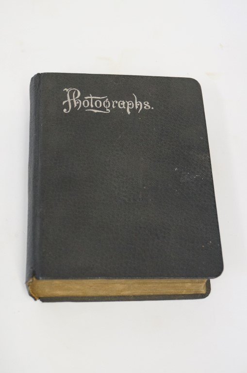 Photoalbum - New Mexico and California: An album of approximately 81 early photographs of New Mexico and California including Albuquerque street scenes, train platforms, horse drawn wagons, folks strolling, boarding wagons, the European Hot