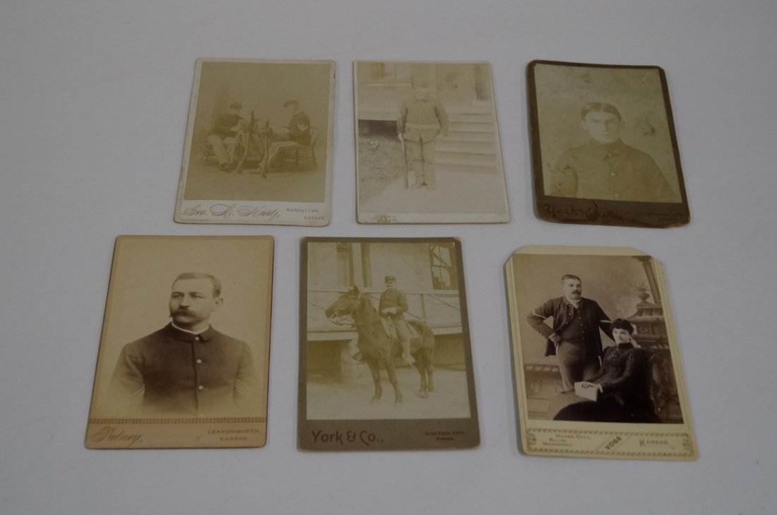 Kansas Military Cabinet Cards (6): By Kurtz, Manhattan. Two by York and Co, Junction City (border stain); By Harris Putney, Leavenworth; Vos, Hays City' Ellis and Wake Eneg (corners clipped which will be visible in photo. ) all 4x6"