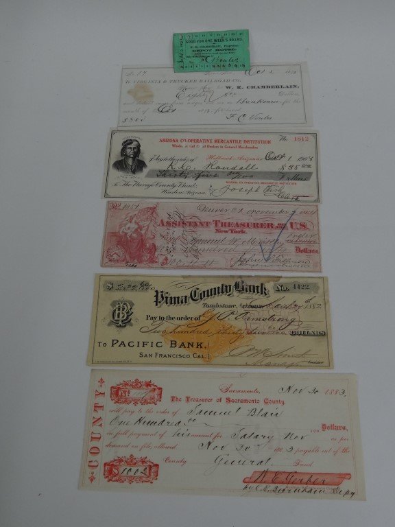 Five Cancelled Checks Inc Tombstone: 1882 Pima County bank, tombstone; 1883 Sacramento County; 1873 Virginia & Truckee Railroad Co Board for W.R. Chamberlain - together with an 1875 Depot Hotel ticket for board showing Chamberlain as the