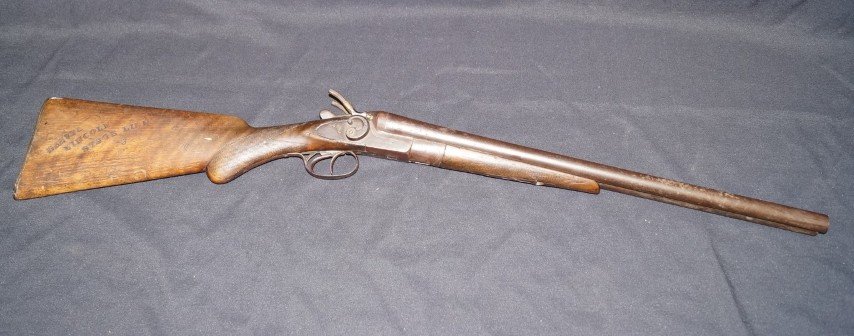 Belgian Trade Stage Line Double Barrel Shot Gun: 12 Gauge. Marked Eclipse on both sides of the trigger mechanism. Impressed on the stock Denver Lincoln Stage Line #3 Overall: Good condition 37" L.