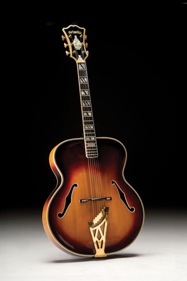 1949 D’Angelico New Yorker: Completed January 15, 1949 for customer Joe Grillo, this D’Angelico New Yorker is a beautiful full-body archtop jazz guitar with a glowing sunburst finish. Instead of the fancy broken pediment desig