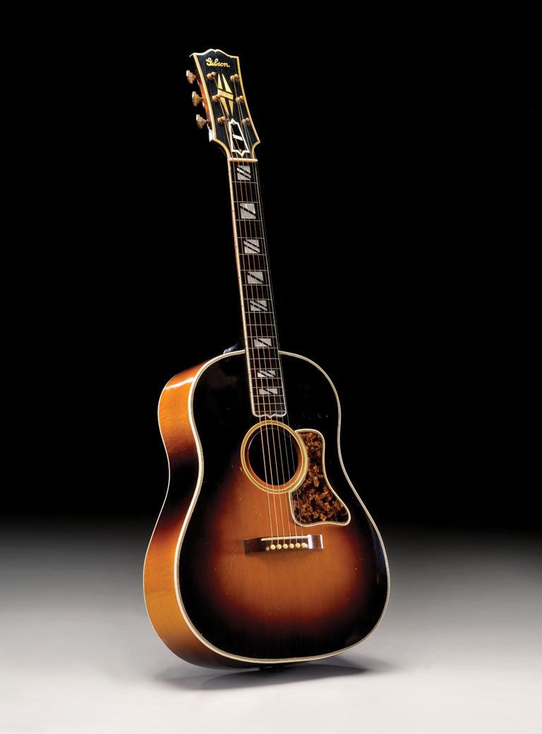 1935 Gibson Super 400 Flattop Custom: Although Gibson generally focused on mass-produced models, customers could special order one-of-a-kind instruments from the company just like they could from an individual luthier like John D’Angeli