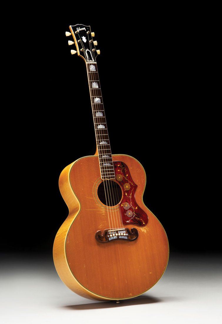 1956 Gibson J-200N: NO RESERVE. In October of 1956, Gibson gave Elvis Presley a blonde J-200 with serial number A22937. Presley’s lead guitarist Scotty Moore had recently signed an endors