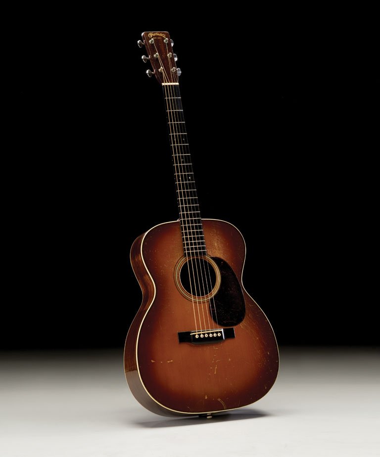 1931 Martin OM-28: The Martin OM-28 is highly coveted by collectors and players alike for its outstanding tone and contemporary features. This is the model that plectrum banjo player Perry Bechtel helped Martin develop 