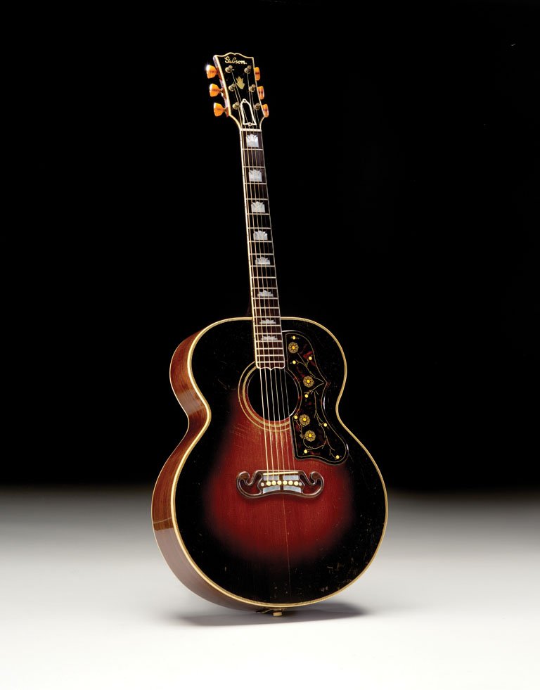 1941 Gibson SJ-200: Here is a very rare pre-war Gibson SJ-200 with the desirable East Indian Rosewood back and sides. Gibson made only about 100 rosewood SJ-200 guitars before the maple version went into production, so i