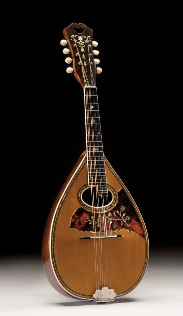 C. Early 1930's Stahl Mandolin: NO RESERVE. Here is another outstanding example of a Stahl mandolin made by the Larson brothers. The rear headstock plate is engraved with a floral pattern in particul