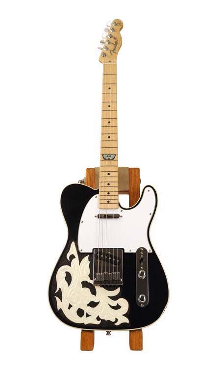 Fender Custom Shop Waylon Jennings Telecaster: Fender Custom Shop Waylon Jennings. Appears to be in mint condition. Complete with case candy, Fender certificate of authenticity, and hand-tooled strap. Serial: WJ035