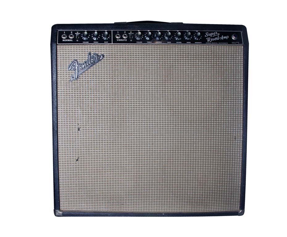 Fender Super Reverb Amplifier: Fender Super Reverb Amplifier in road case. Black face. '60s vintage amp. Three blue label Fender speakers. One replaced Celestion speaker. Complete with foot-switch. Serial number: A15485.
