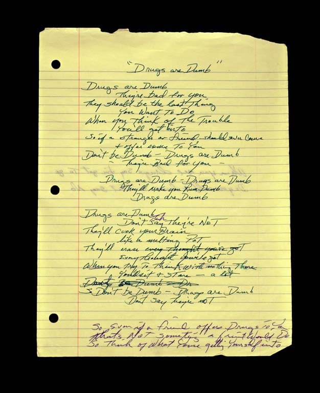 Extensive Handwritten Lyrics for the Song "Drugs are: On both sides of single lined sheet of yellow paper, Waylon wrote the extensive lyrics to a song he titled "Drugs are Dumb." Given the issues he had off-and-on through his career with substance abuse,