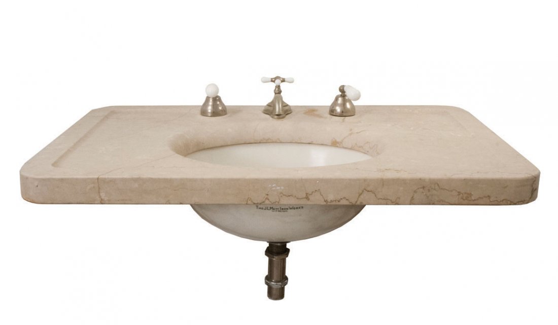 MARBLE SINK WITH PORCELAIN BASIN, EARLY 20TH CENTURY: Established in the Bronx in 1828, J.L. Mott Iron Works made its namep Secializing in plumbing fixtures, water fountains, and stoves,. (1.5" dia nickel and glass legs will be added to the washstand top