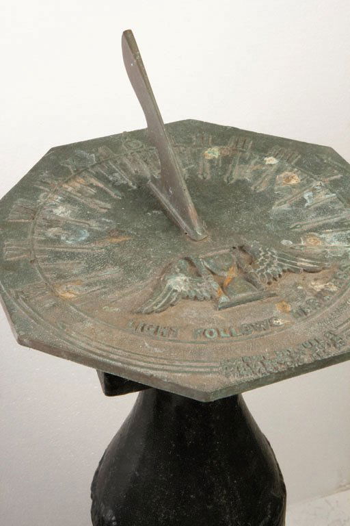 CAST IRON BRONZE SUNDIAL, C. 1980: Sundial made of cast iron and brass. H 30" Sundial dia. 10.5"