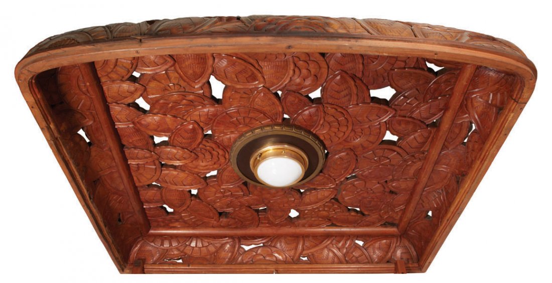 LE BON MARCHE ELEVATOR CAB TOP, CUBAN MAHOGANY C. 1920: The elevator cabs of the famed Le Bon Marche would have only used exotic woods. This cab is carved allover from Cuban mahogany with an Art Deco floriate pattern. 70" x 63.5" x 10"