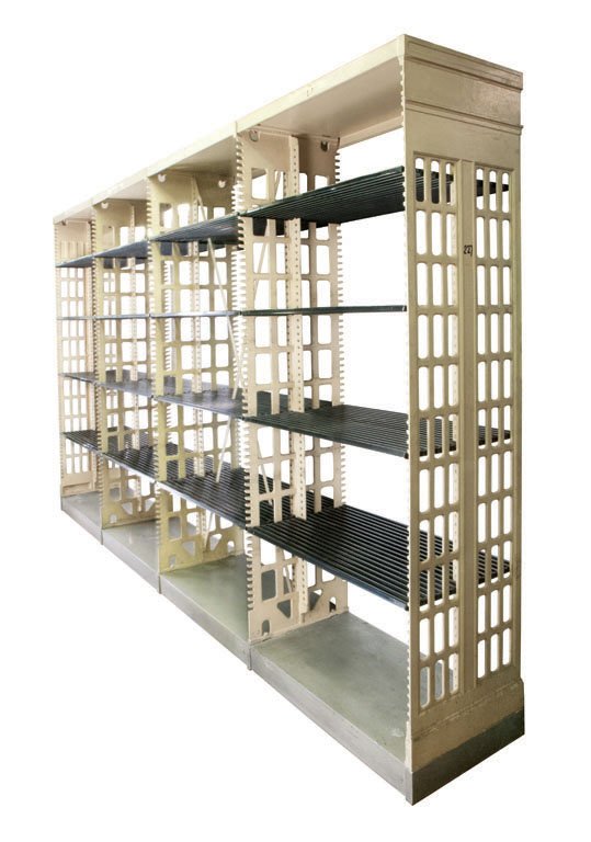 (1) LIBRARY SHELVING UNITS EACH CONTAINING FOUR SECTIO: Designed by Bernard R. Green, Chief Engineer of Snead and Company Iron Works, these cast iron book stacks were the solution for high-volume library shelving. Since its original patent in 1875, the Sne