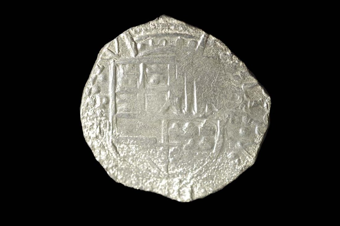 Silver Coin: Coin #270322 Shipwreck: Atocha 1622 Mint: Potosi. Grade: 1 Denomination: 8 reales Assayer: T X62X The silver coins of this era were popularly known as "pieces of eight" (reale de ocho) in the Spanish 