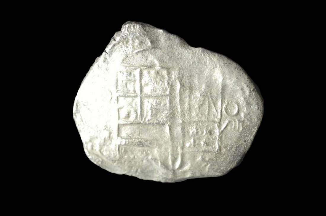 Silver Coin: Coin #20393 Shipwreck: Atocha 1622 Mint: Potosi. Grade: 2 Denomination: 8 reales Assayer: T 162X The silver coins of this era were popularly known as "pieces of eight" (reale de ocho) in the Spanish c