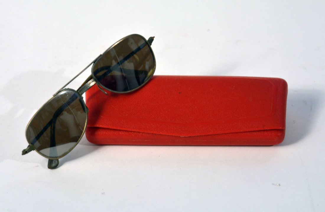 Johnny Winter's Aviator Sunglasses: Aviator sunglasses, sold in red eyeglass case.