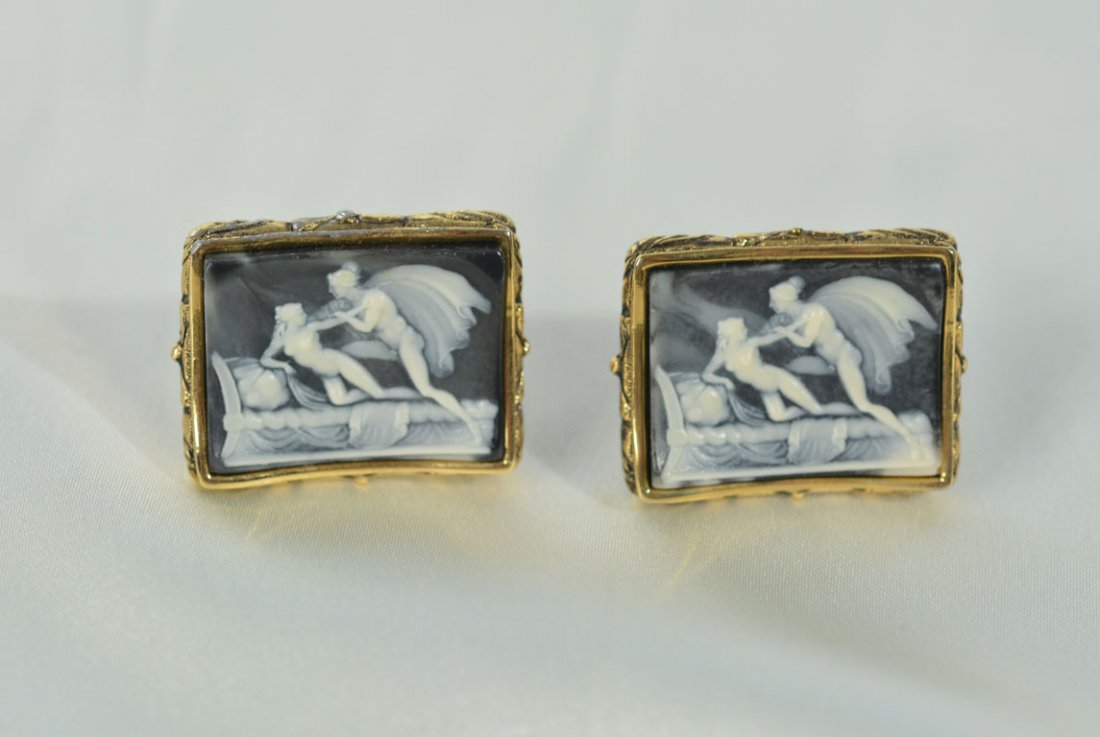 Johnny Winter's Erotic Cufflinks: Gold cufflinks set with erotic carving. Cufflinks feature ornate carving around edges. "Museum Masterpiece by DANTE."