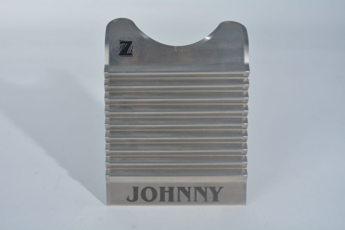 Johnny Winter Rubboard: Made specially for Johnny Winter by Tee Don, Key of Z Rubboards. Approx. 8" tall.