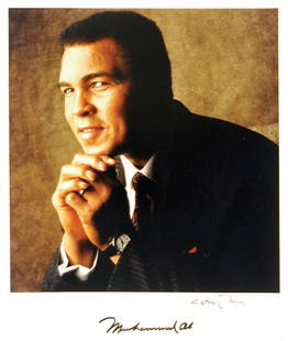 William Coupon (b. 1952): Note: Description Updated 11/21. Muhammad Ali. Color, 1991. Vintage Type "C" print. Portrait of a smiling Muhammad Ali. Signed in ink by Muhammad Ali. Signed in ink by photographer. 14 x 11in. The pho