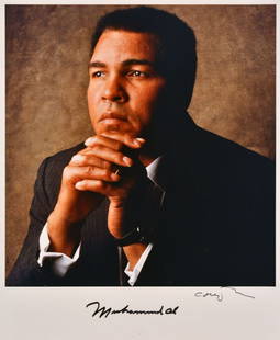 William Coupon (b. 1952): Note: Description Updated 11/21. Muhammad Ali . Color, 1991. Vintage Type "C" print. Signed by ink by both Muhammad Ali and photographer. 14 x 11in. The photographs in this auction have been examined