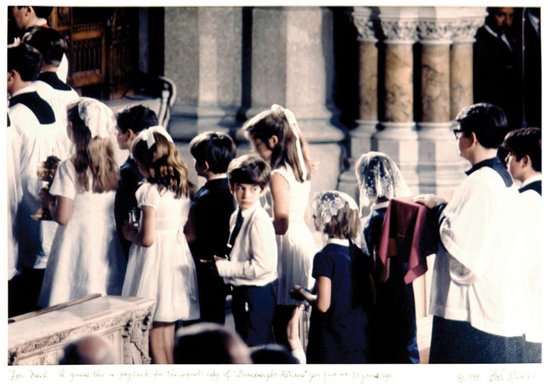 Bob Gomel (b. 1933): Note: Description Updated 11/21. John F. Kennedy Jr. at Robert F. Kennedy's Funeral. Color, 1968. Type "C" older print. John F. Kennedy Jr. looking back while walking with his sister and other Kennedy