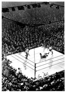 Gjon Mili (1904-1984): Joe Louis vs "Jersey Joe" Walcott. B&W, 1947. Framed. Joe Louis vs. "Jersey Joe" Walcott at Madison Square Garden. Signed in ink on image by photographer. 20 x 16in. This framed work has been professi