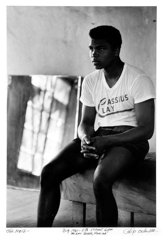 Flip Schulke (1930-2008): Note: Description Updated 11/23. Cassius Clay. B&W, 1961. Fiber-based silver gelatin. Older print. Framed. Young Cassius Clay at the 5th Street Gym in Miami Beach. Signed, titled, and inscribed in ink
