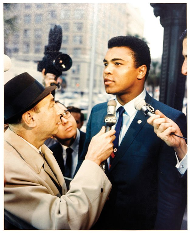 Muhammad Ali Refuses Army Induction: Note: Description Updated 11/22. Color, 1967. Type "C" older print. This photograph was taken immediately following Ali's refusal to be inducted into the U.S. Army. Howard Cosell, the controversial jo