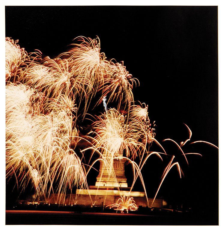 Lady Liberty with Fireworks: Color, 1986. Taken during the "Liberty Weekend" Statue of Liberty Centennial festivities. Signed in ink by Neil Leifer. 20 x 16in. The photographs in this auction have been examined by an expert, whos