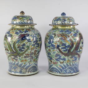 Pair of Chinese famille rose porcelain covered jars with polychrome decoration of dragons among (1 of 9)
