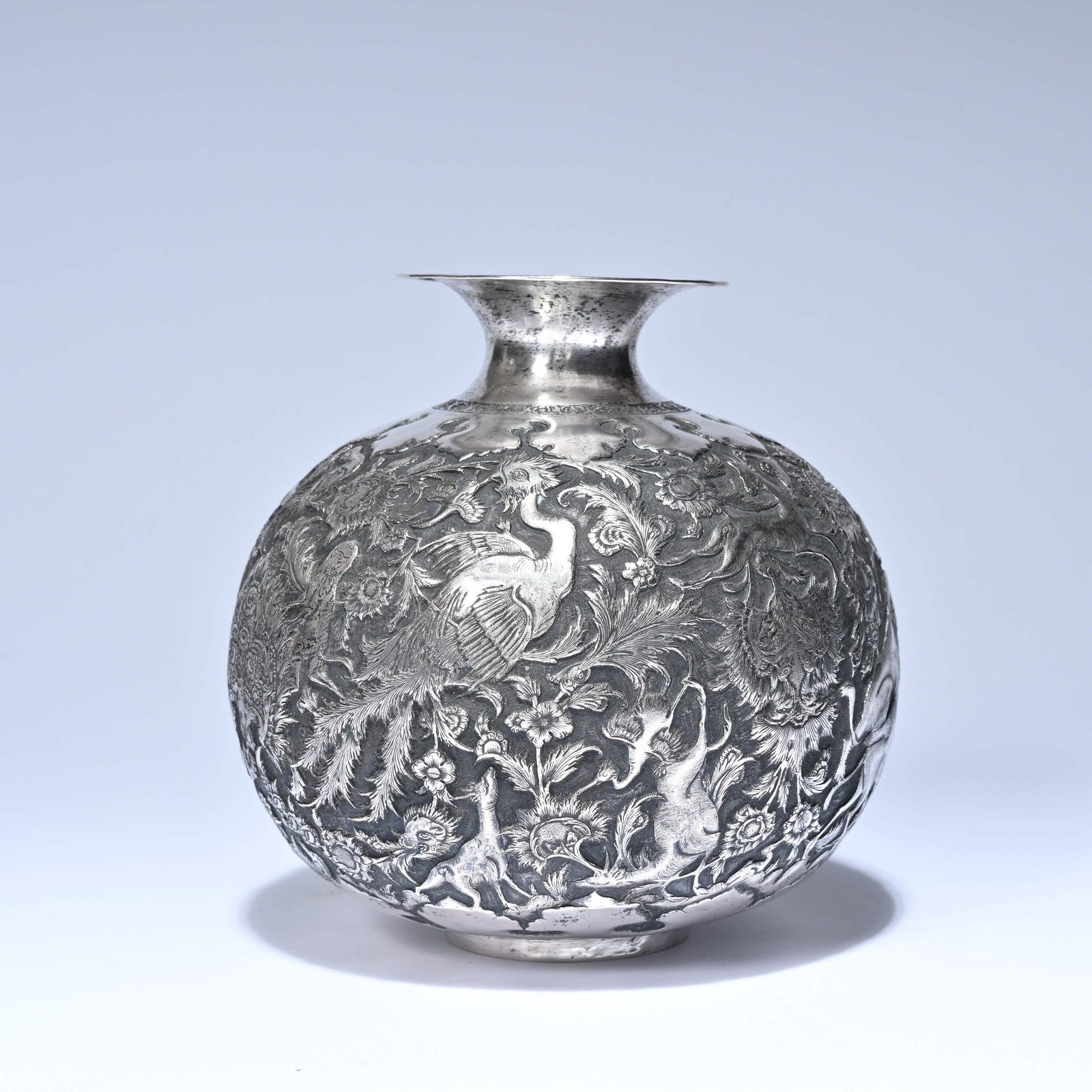 Solid silver vase with faunal and floral relief decoration from Persia or the Middle East, marked, (1 of 11)
