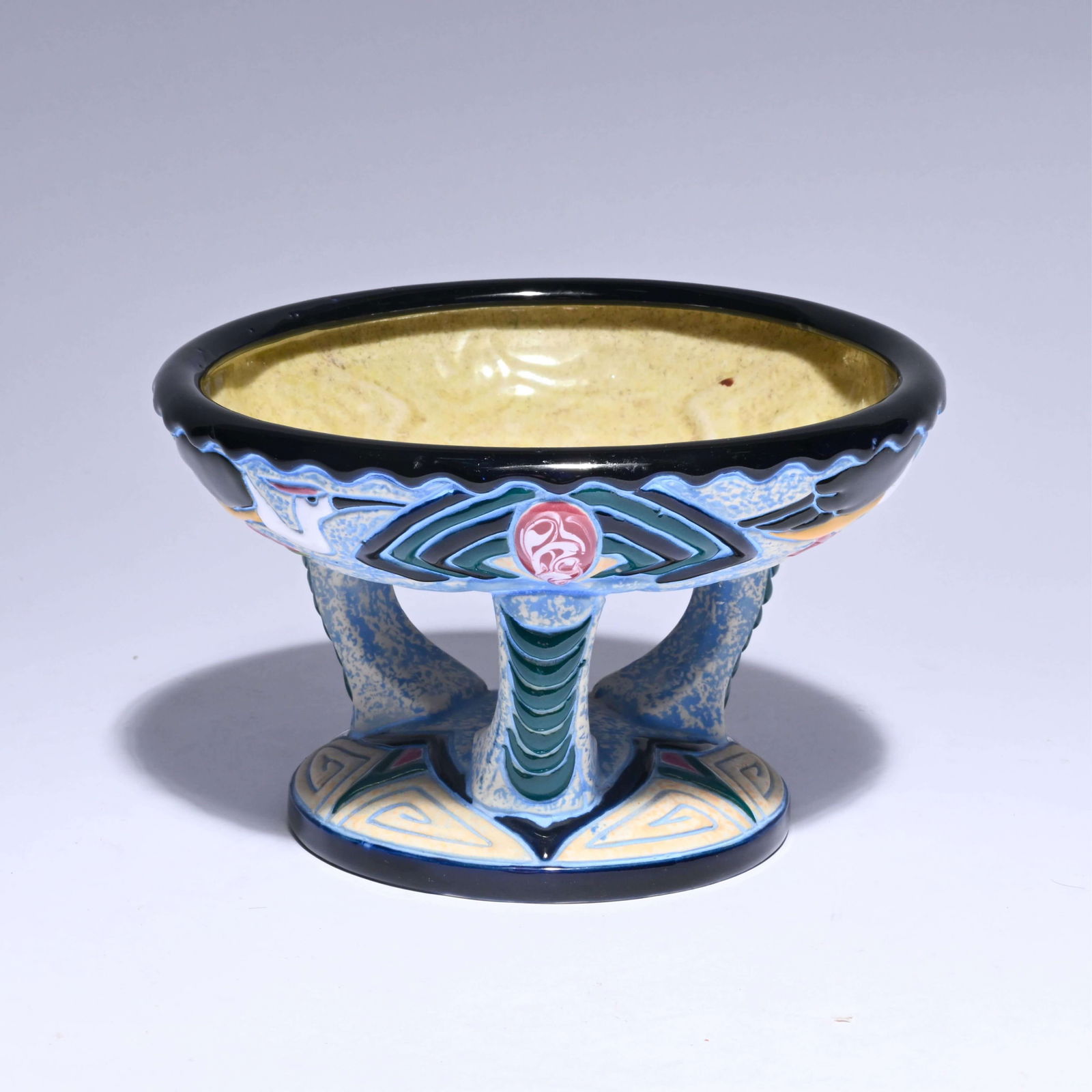 Polychrome Amphora Art Deco ceramic bowl on an openwork base with a decoration of stylized birds and: Polychrome Amphora Art Deco ceramic bowl on an openwork base with a decoration of stylized birds and geometric motifs, marked Amphora, Czecho-Slovakia, circa 1930Polychrome AmphoraArt Deco keramische