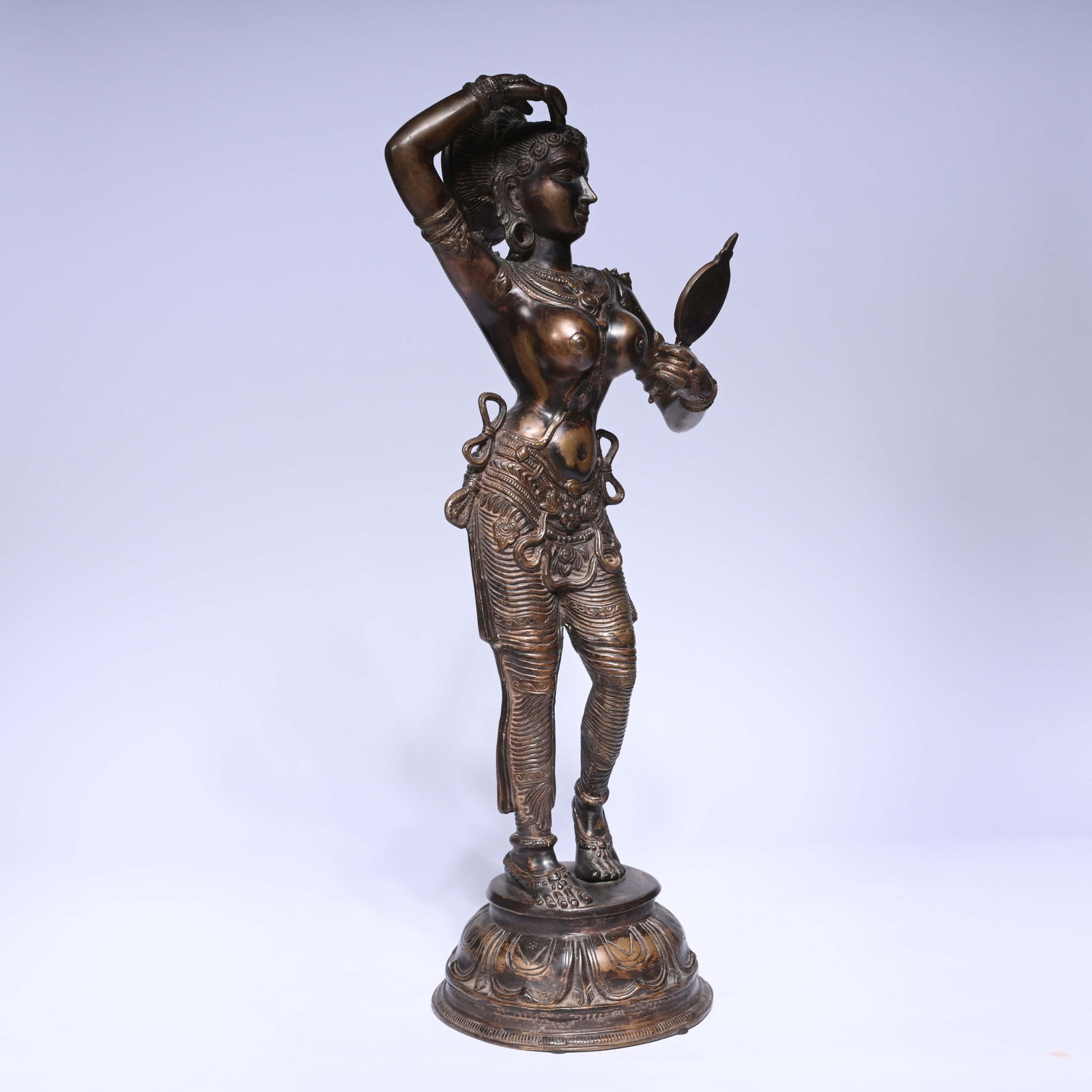 Finely crafted Indian bronze statue of a graceful female figure, probably a temple servant or (1 of 6)