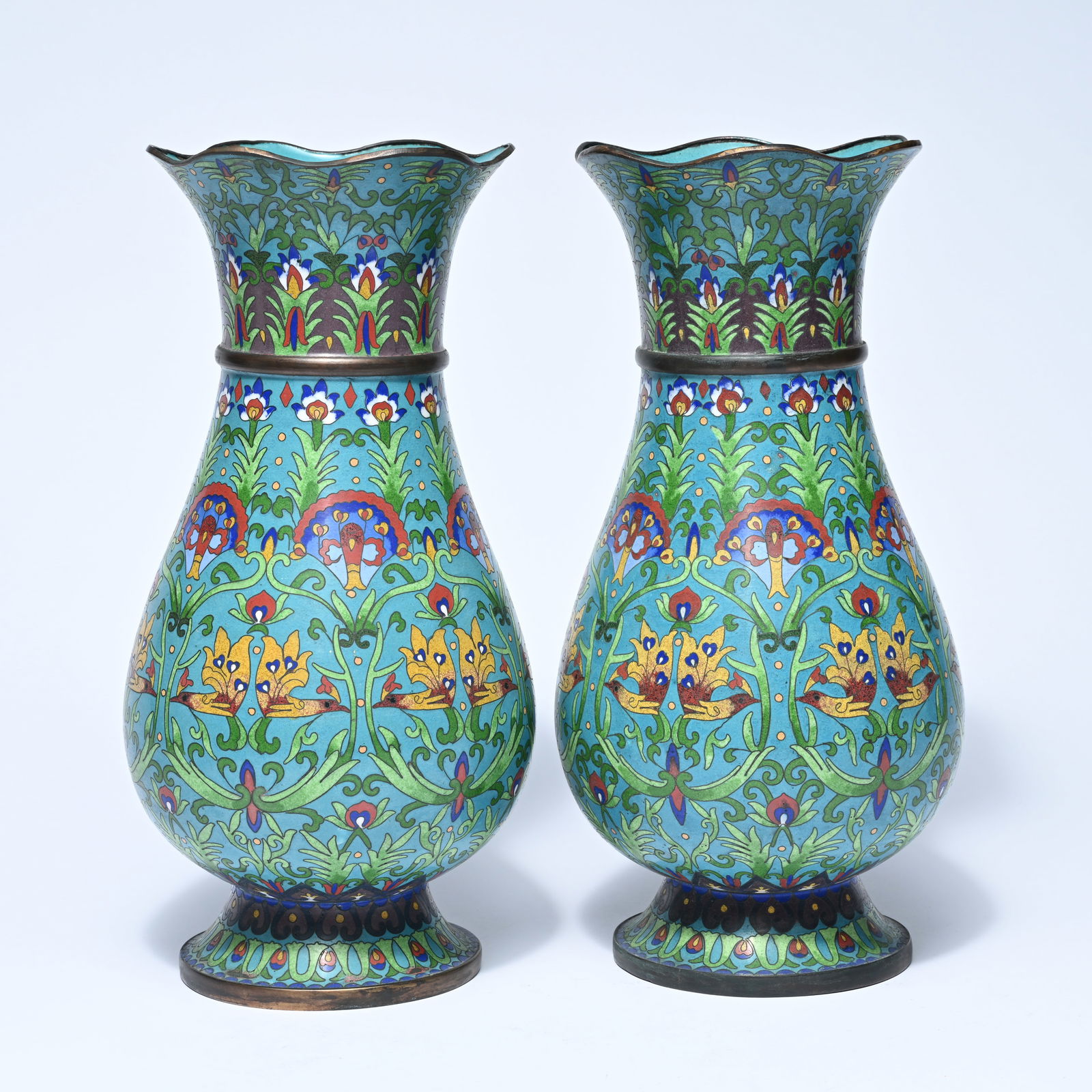 A pair of Chinese cloisonné vases, 19th century, with a slightly wavy rim and a rounded shape on a (1 of 7)