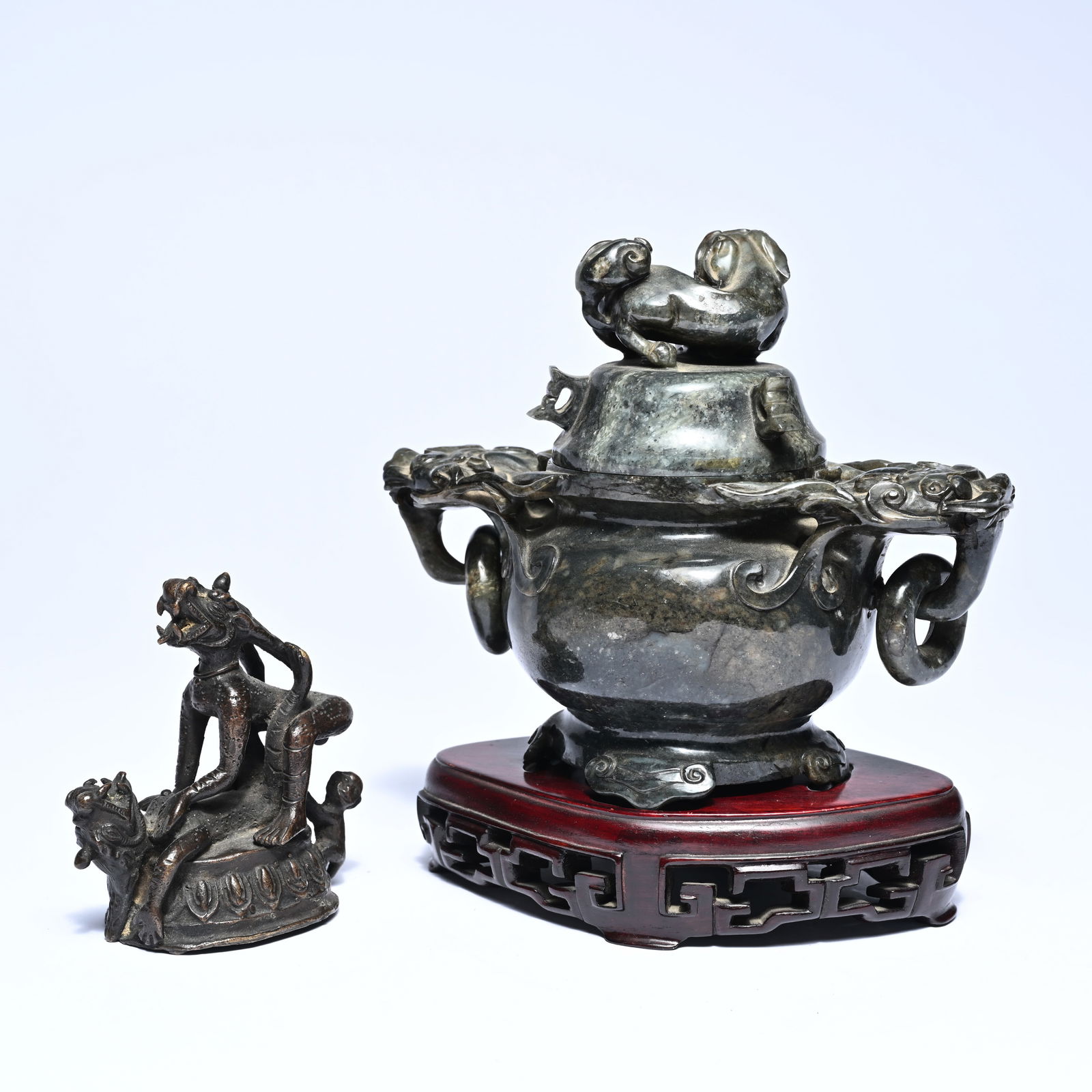 Chinese erotic bronze sculpture and incense burner in hard stone with mythical figures as handles (1 of 8)