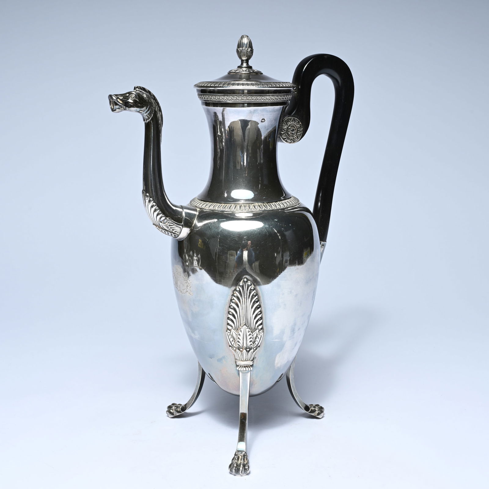 Silver French coffee pot on three claw feet and a spout in the shape of a horse's head, decorated (1 of 9)