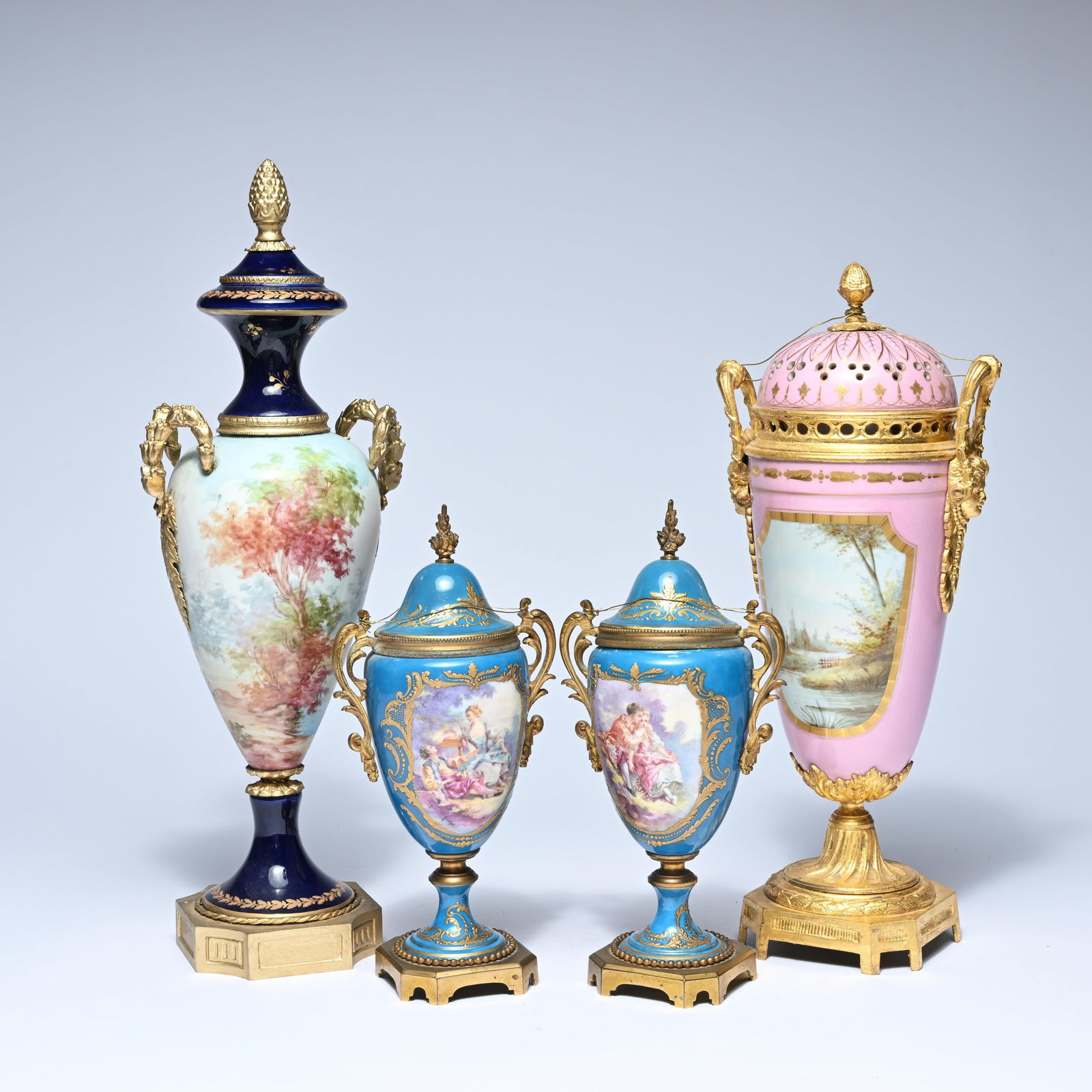 A pair of Sèvres-style covered vases in 'Bleu céleste' porcelain with hand-painted romantic scenes (1 of 9)