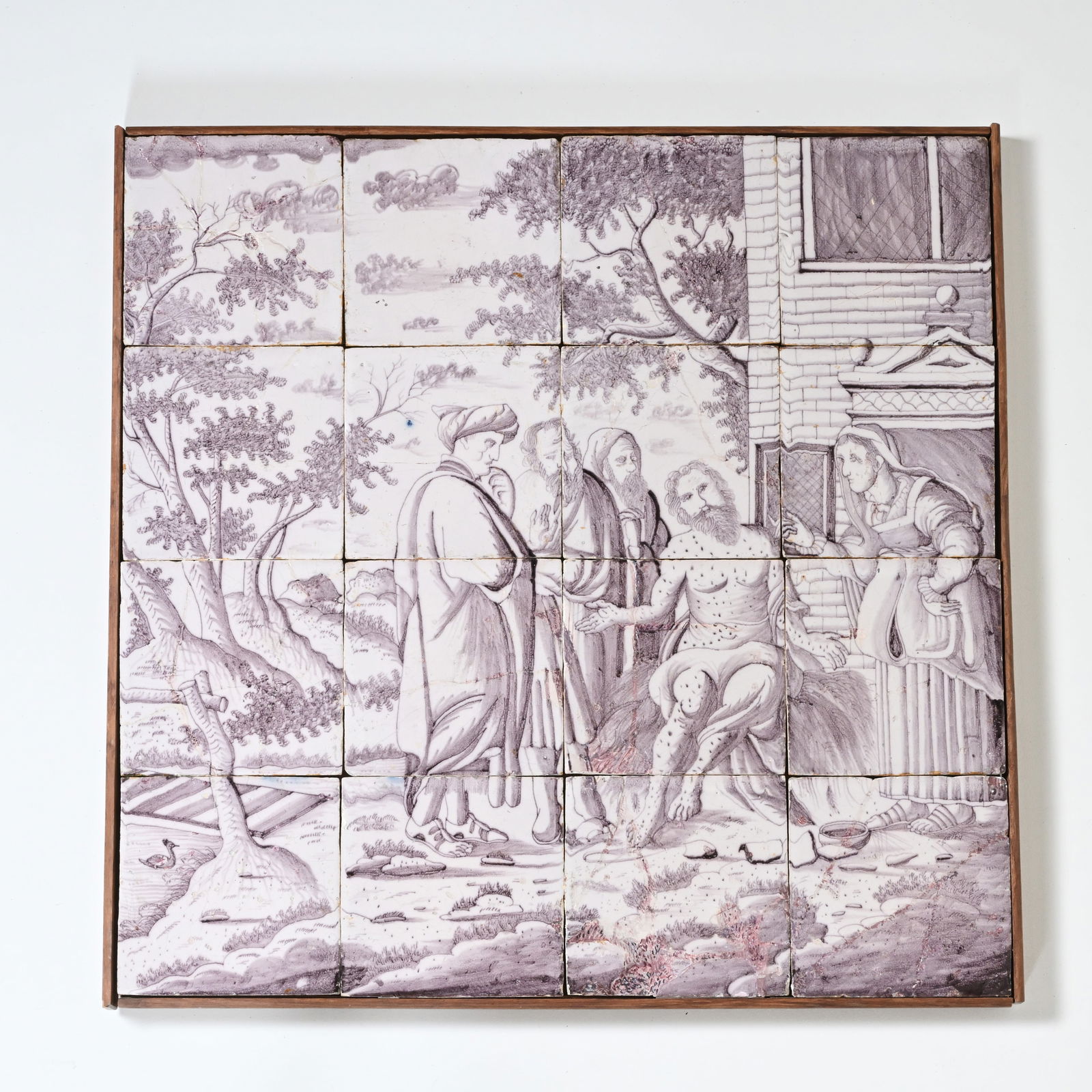 Delft manganese tile panel depicting a biblical scene, ‘Christ and the Samaritan woman’, (18th: Delft manganese tile panel depicting a biblical scene, ‘Christ and the Samaritan woman’, (18th century)Delftse mangaan tegeltableau met afbeelding van een Bijbels tafereel, ‘Christus en de Samar