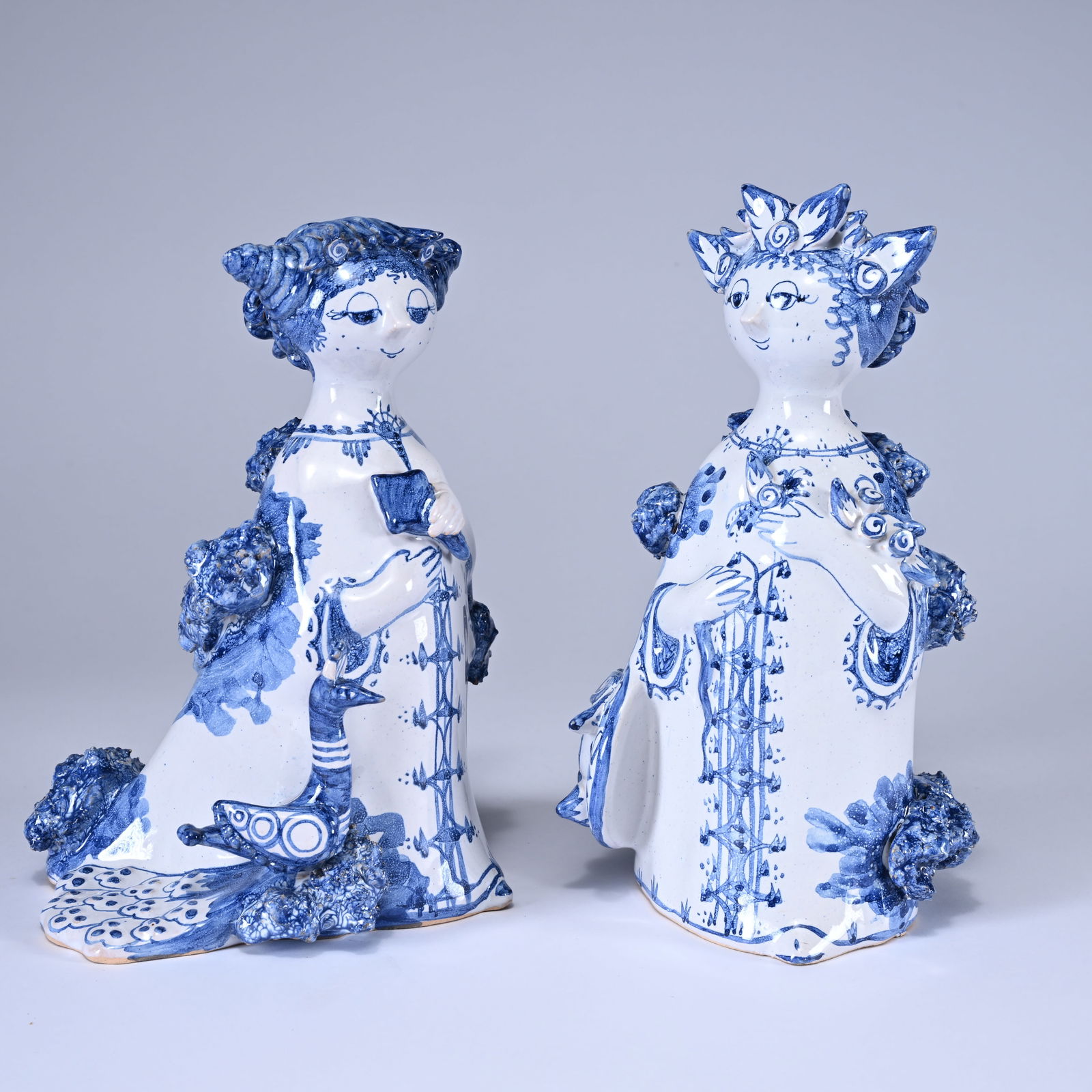 2 ceramic figures by Bjørn Wiinblad (Denmark), made in blue and white decor with relief details, (1 of 8)